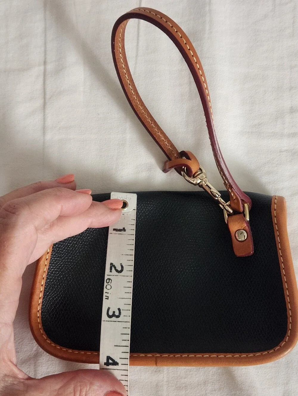 Dooney and Bourke Pebbled Leather Bristol Pouch with Clip Black w Brown Trim